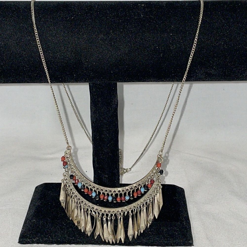 Beautiful necklace with hanging beads and metal fringe